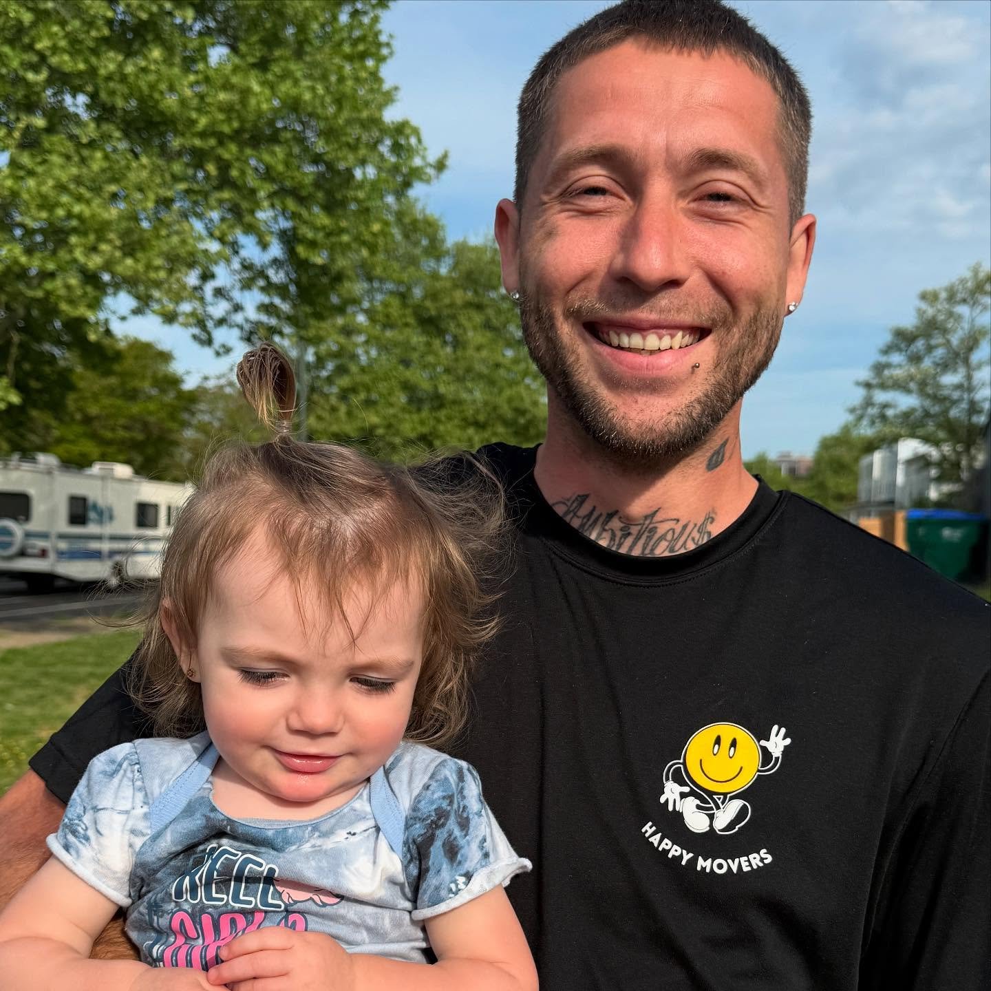 Happy Movers team member with his daughter